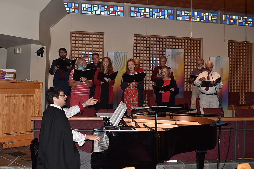 Michael Bodnyk led a maskless choir in church.
