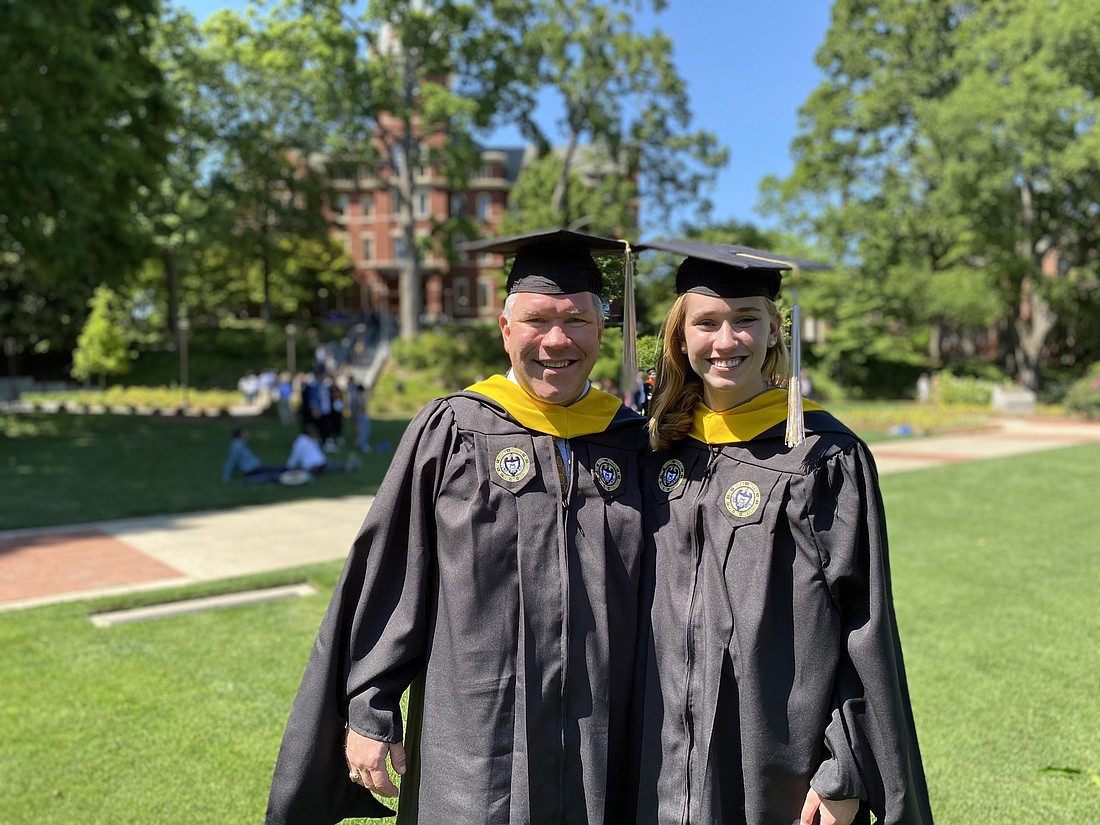 Scott and Sarah Stevens both graduated with a master&#39;s degree in analytics from Georgia Tech University in Atlanta May 7 at Bobby Dodd Stadium.