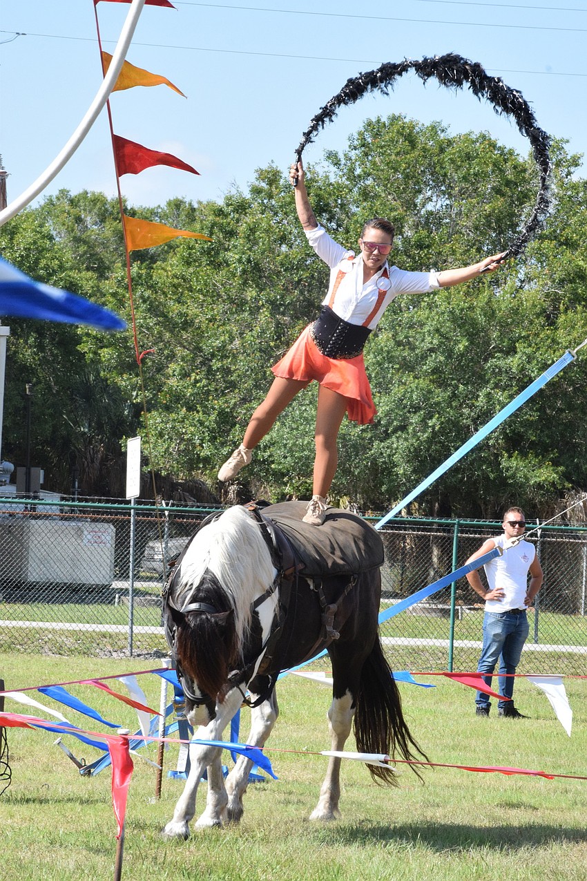 Mercedes Pages with Circus on the Ranch jumps rope while standing on top of a galloping horse.