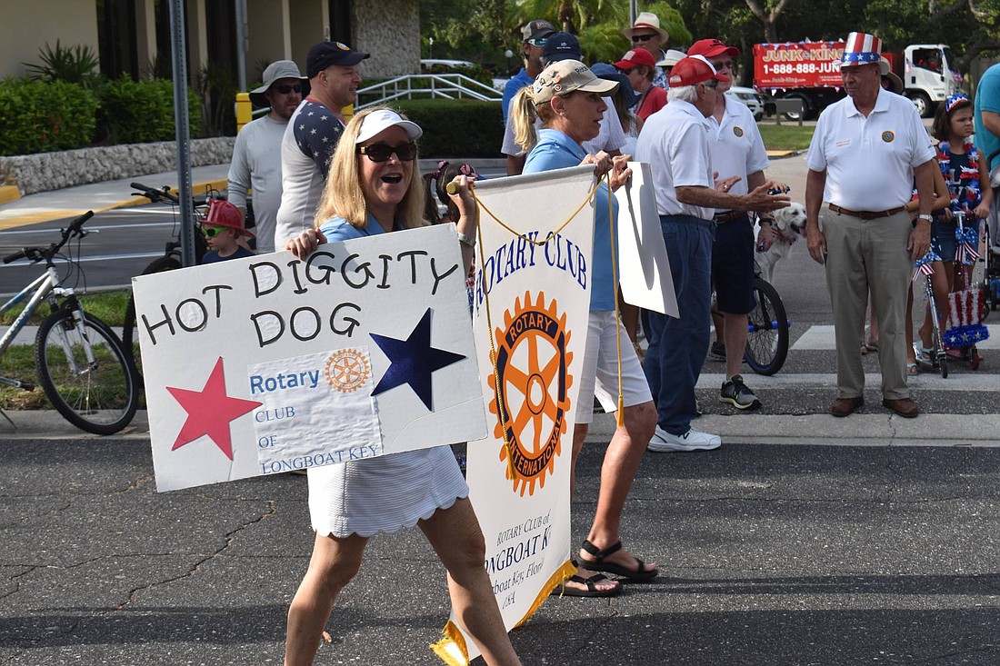 Susan McGuire and Nancy Rozance led the wave of Rotary Club members in the 2019 parade.