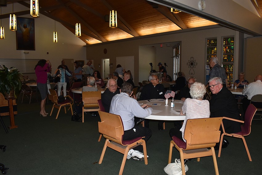 About 60 people attended the luncheon.
