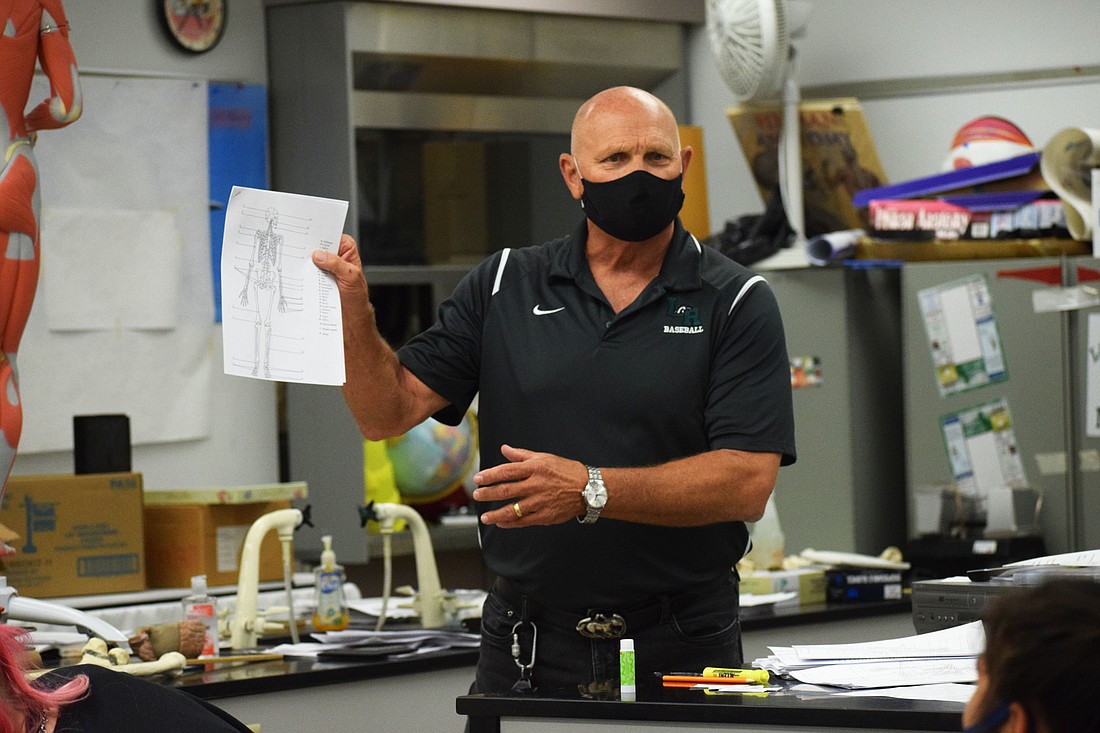 Faust DeLazzer, a science teacher at Lakewood Ranch High School, asks his students if they&#39;re prepared for their exam.