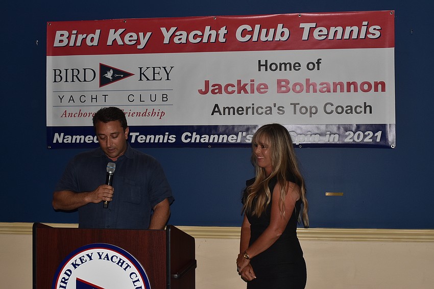 Hagen Brody gives a mayor's citation to Jackie Bohannon