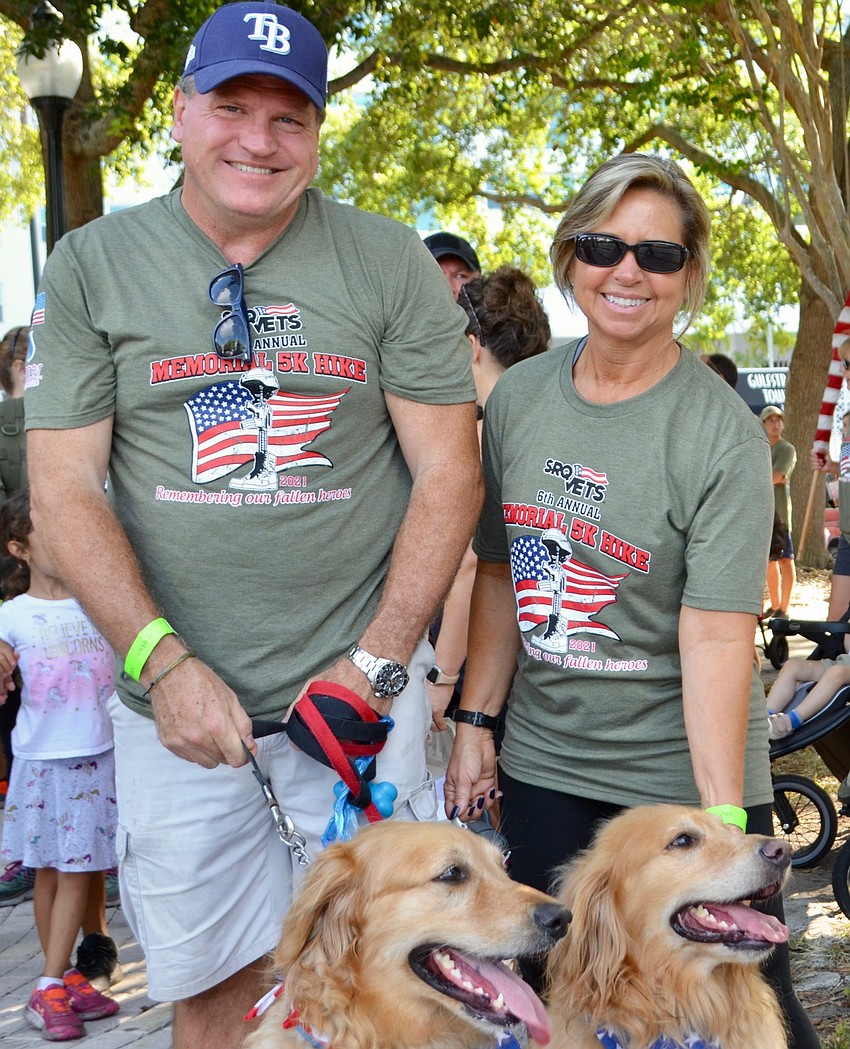 Matt and Lori Augustyniak prepare to begin the hike with Kita and Kenai.
