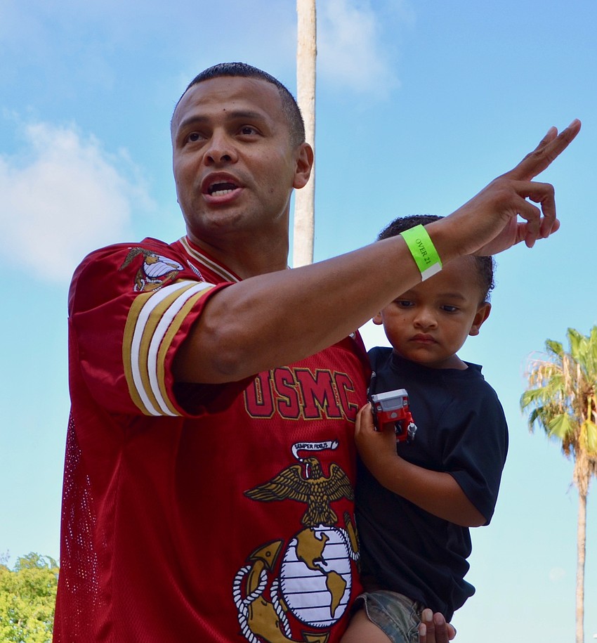 Carlos Moreira helps instruct the hikers on the morning holds for them, along with Miguel Moreira.