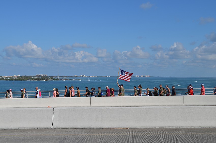 At the top of the Ringling Bridge, the hikers stretched out for hundreds of yards.