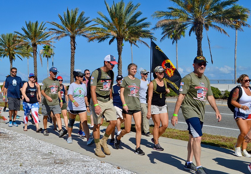 The group finishes walking the span of the John Ringling Bridge on the return leg of the 5K hike.