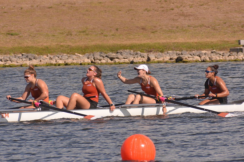 Texas rowers Parker Illingworth, Samantha Schalk, Hannah Medcalf and Maria Valencia celebrate after the school's II 8+ boat won its heat Saturday (6:11.52). Medcalf tossed water on her teammates.
