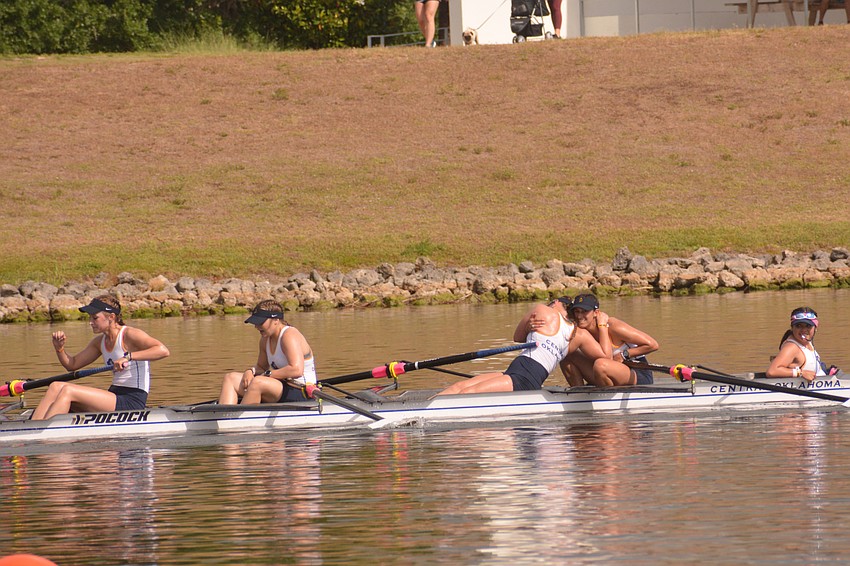 The Central Oklahoma 4+ boat (rowers Sage Kroeker, Danielle Dick, Allison Staley and Kelsey Woellmer and coxswain Yesenia Gil-Salazar) celebrates after winning the event's Division II grand final (7:42.66).