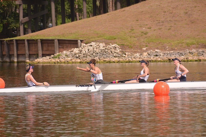 Members of the Central Oklahoma 8+ boat (Madisyn Kitchell, Kateryna Klymenko, Megan Dwarshuis and Shelby Wackerly) celebrate after winning the event's Division II grand final (6:39.73)
