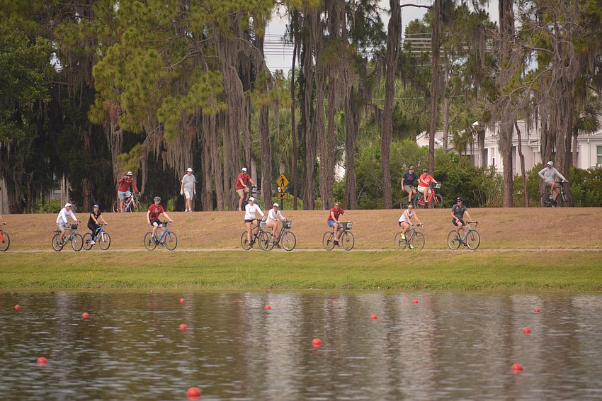 Some fans chose to ride bikes alongside each race at Nathan Benderson Park.