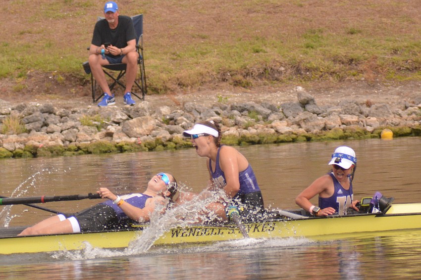 Members of the Washington 4+ boat(Katherine Slack and Sophia Chaffey and coxswain Sachi Yamamoto)  celebrate after winning the event's Division I grand final (7:02.17).