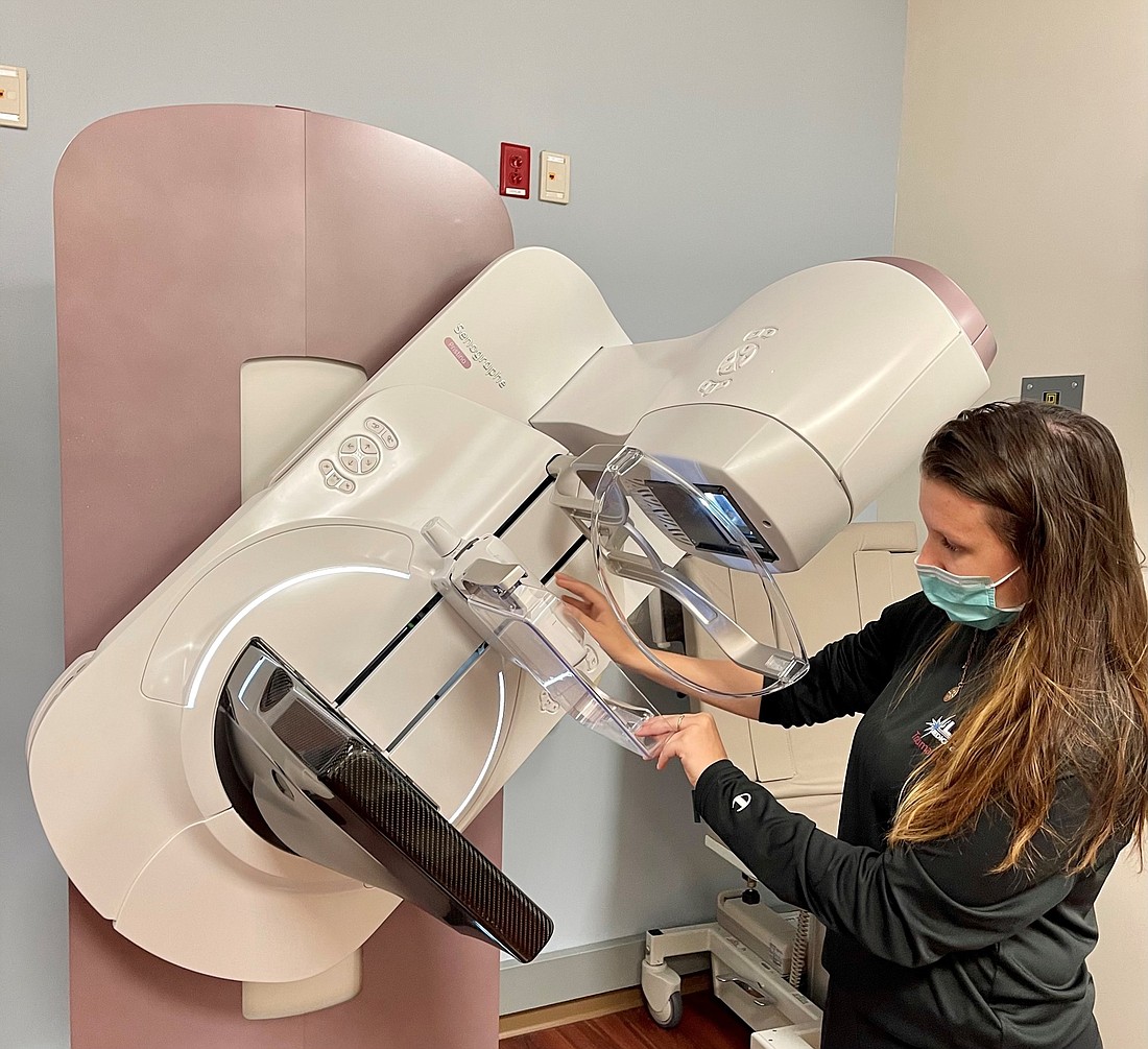 Mammography Technician Anne Trefil uses the GE Senographe Pristina 3D Mammography System at Blake Medical Centerâ€™s Center for Breast Health. Picture courtesy of Blake Medical Center Director of Communications Lisa Kirkland.