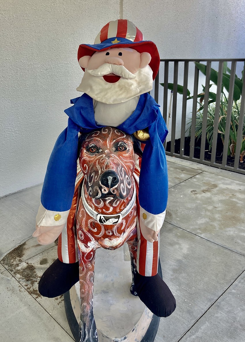 Even the dog statue outside the Tennis Gardens got in on the patriotic fun. Courtesy photo.