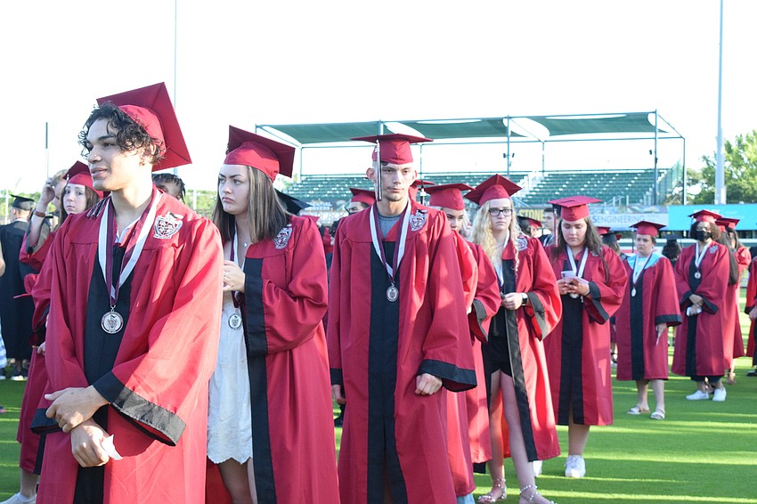 Braden River High School graduates line up for the processional at LECOM Park.