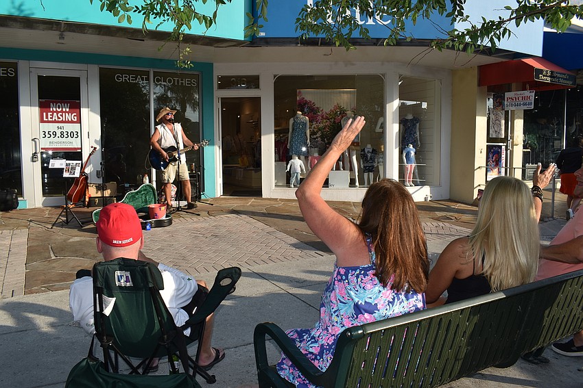 JT Teis had a group of friends come out for his first busking experience.