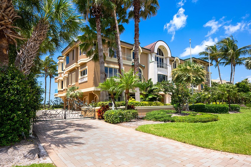 The home at 3105 Gulf of Mexico Drive features 175 feet of beachfront.