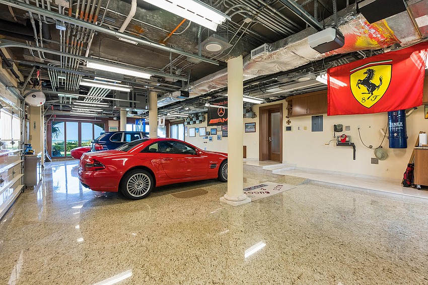 The ground-floor garage can hold seven cars in a climate-controlled environment.