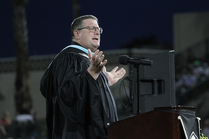 Principal David Jones speaks to the graduates.