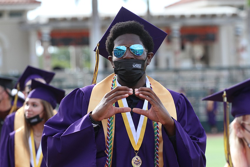 Demario Evans is all hearts on graduation day.