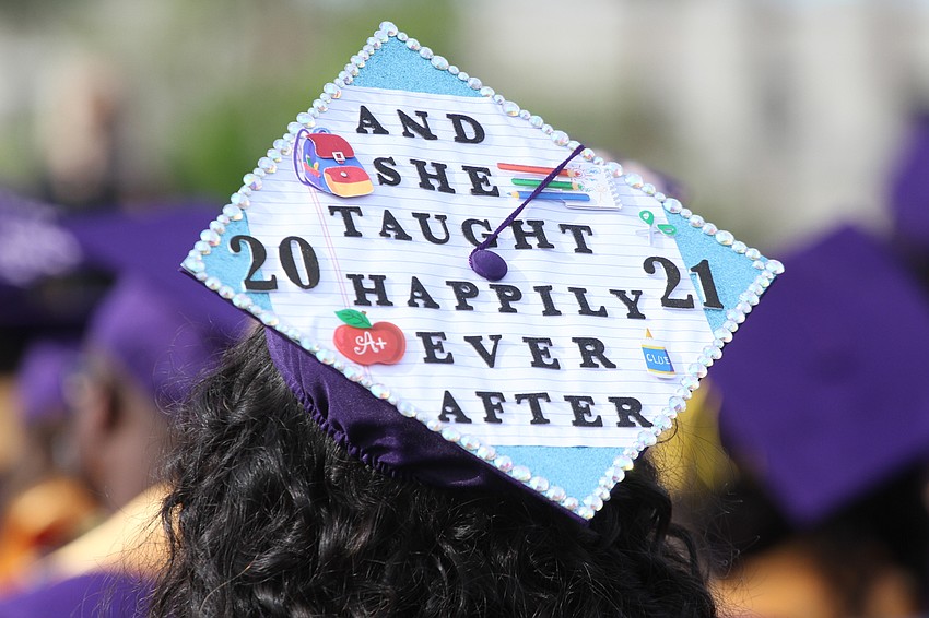 Ashley Ojeda brings her decorated cap.