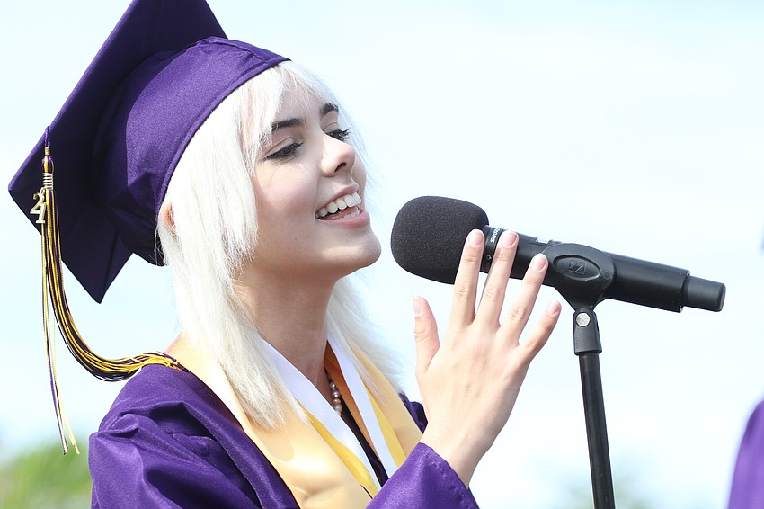 Anne Marie Sledziewski sings with Category 5.