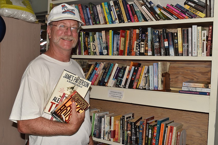 Dave Wassenstein with his books.