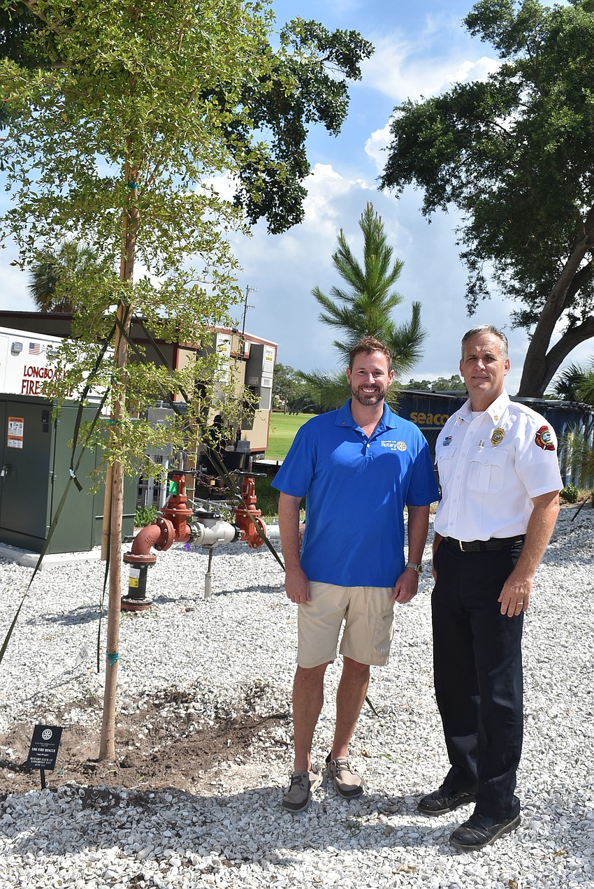 Bo Fuller and Paul Dezzi by the newly dedicated shady lady.