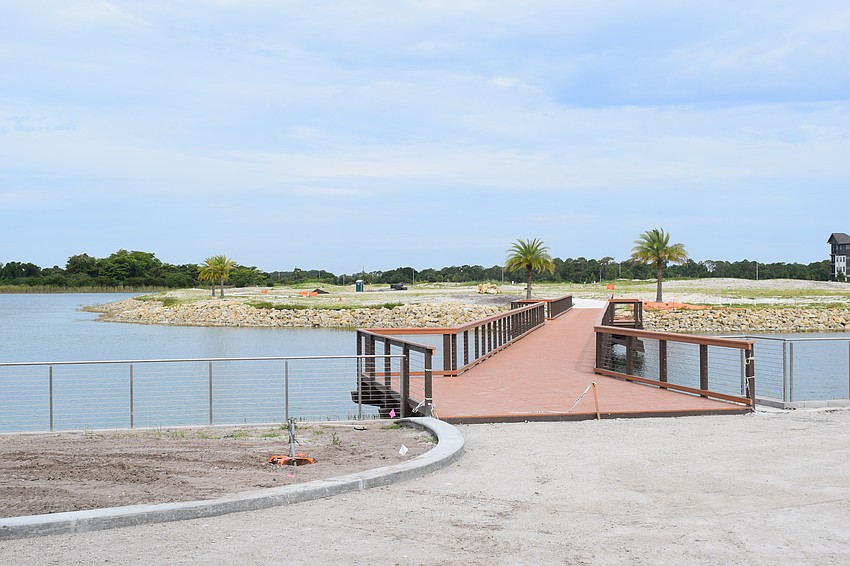 The bridge to the island park also serves as a nice viewing point of Waterside Place.