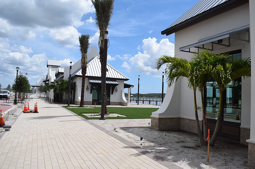 Wide sidewalks will be able to host tables and umbrellas from merchants.