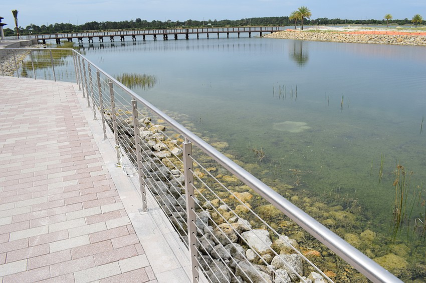 The stainless steel wire fencing allows for views of the lake.