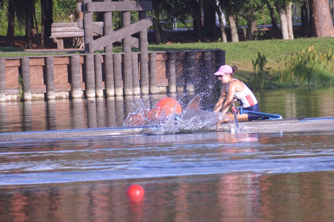 Your Observer Photo Sarasota Crew's Eva Harris splashes the water