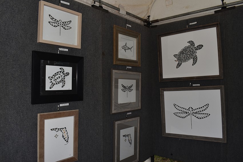 Art by Kevin Kennedy features shark teeth that the artist dives for.