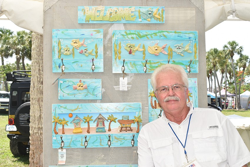 Jeff King sits with his wall hooks.