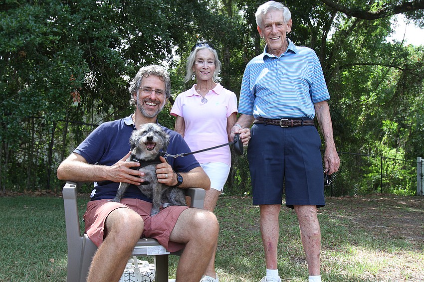 Rabbi Brenner Glickman with Summer Baum, Donna Jable and Jack the dog.