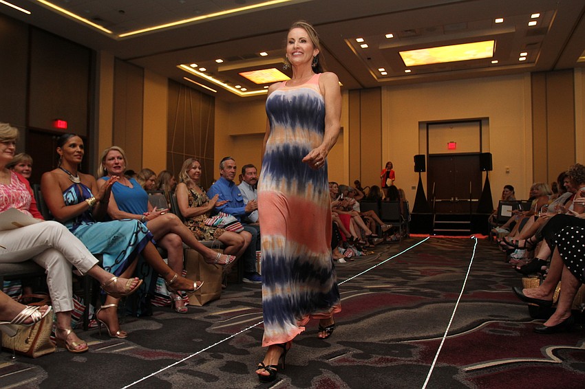 Models walk the runway wearing items from Pink Sebastian Boutique.