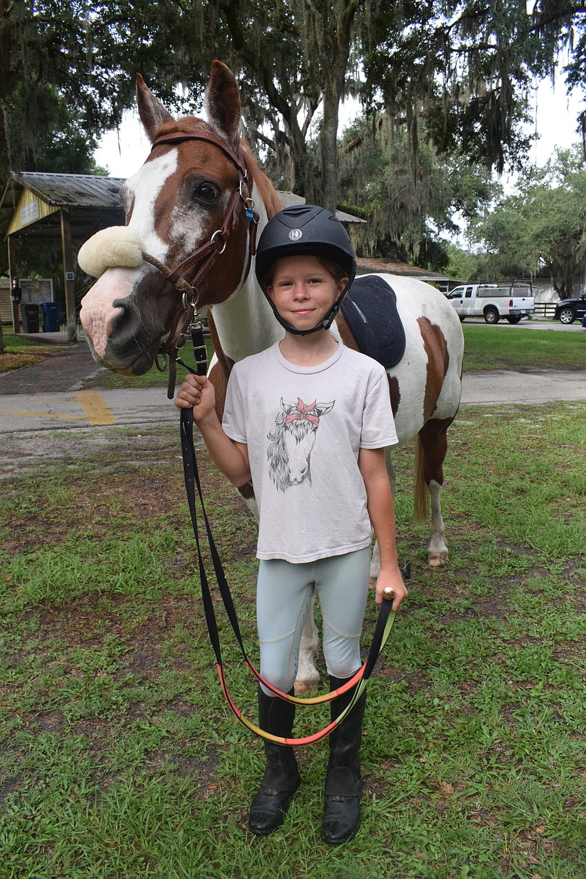 Kamila Rencher, who is 10, has been riding for two years.