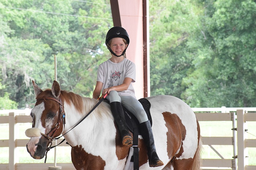 Kamila Rencher, who is 10, loves spending time with Gracie.
