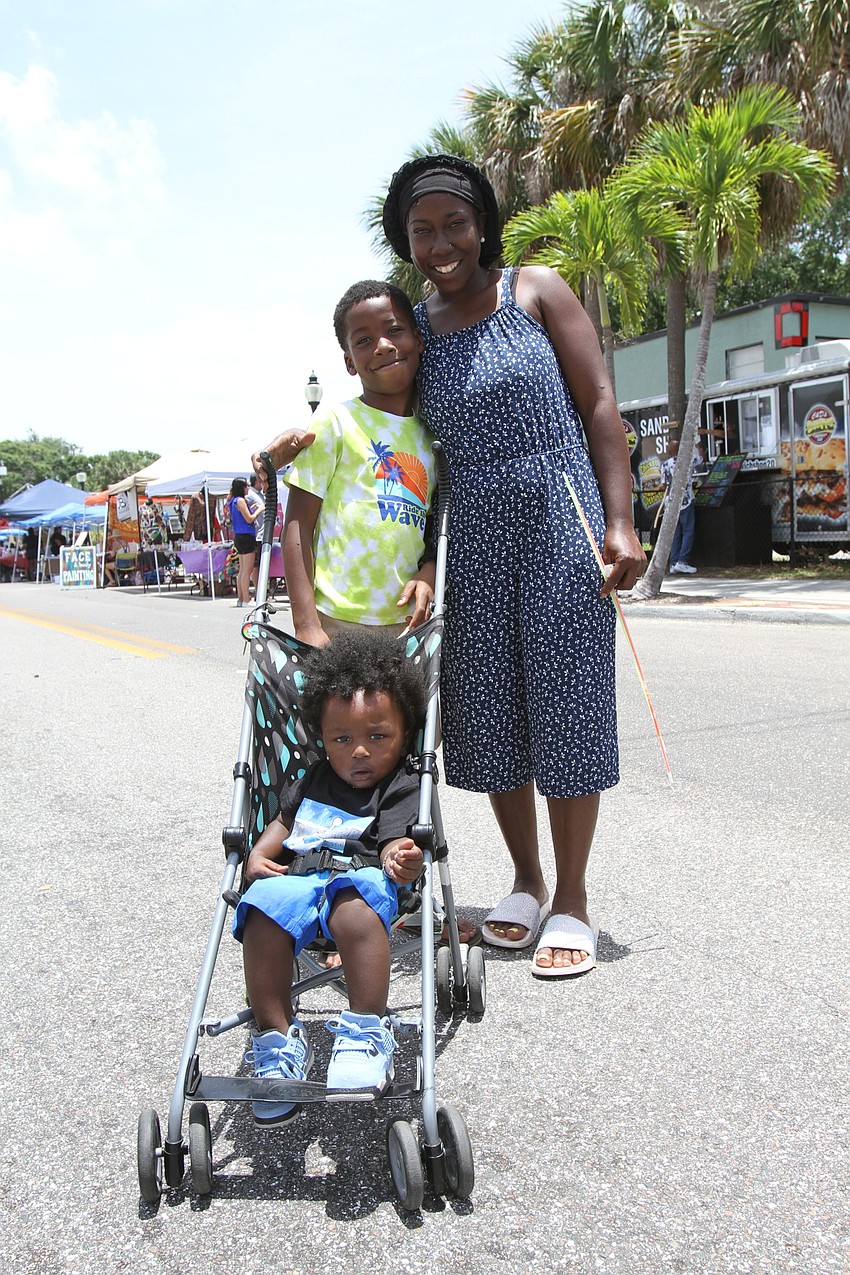 Ruben Henderson with Saquan and Sanquan Slaughter