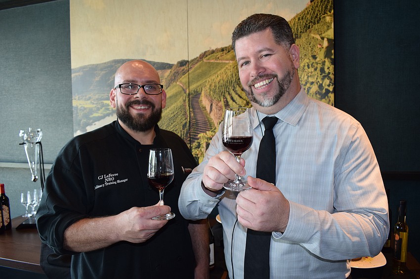 Cooper's Hawk Chef CJ LeFevre and General Manager Pedro Torres are ready to meet patrons on the restaurant's opening day, Monday, June 28.