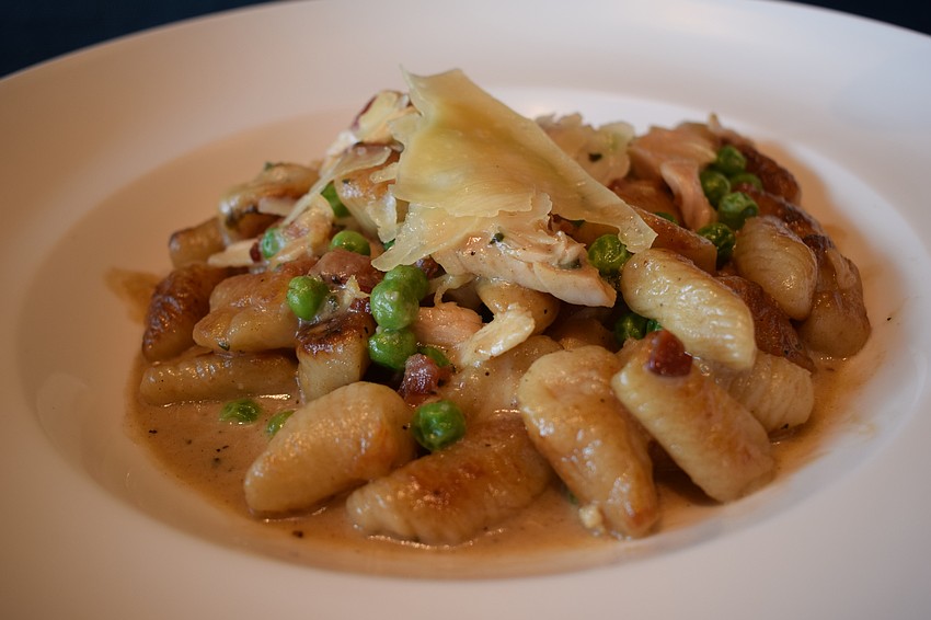 The gnocchi carbonara ($22.99) recipe includes pancetta, chicken, sage, peas and parmesan garlic cream sauce.