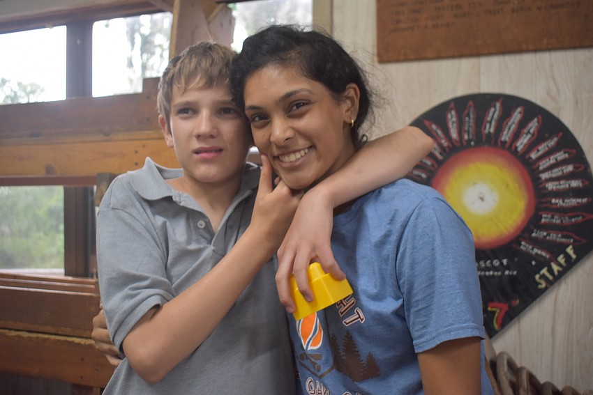 Vanya Ivanskaya, 12, and Tampa's Shreya Shah team up to play Four Corners together. Ivanskaya moved to the U.S. from Russia two weeks ago.