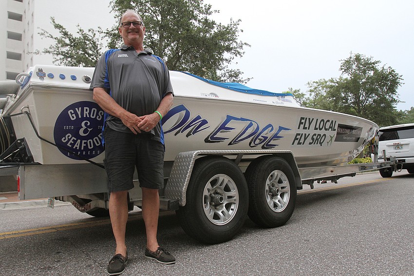 Bill Quinn with his boat the On Edge