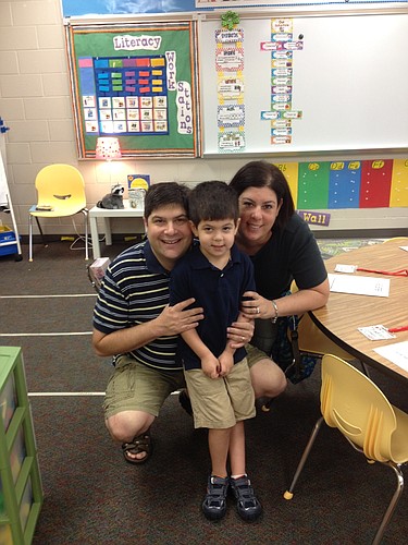 Mark, Elyse and Aaron Gordon on the first day of Kindergarten at Willis Elementary School in August, 2013