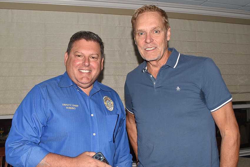 Deputy Police Chief Frank Rubino and Chris Sachs