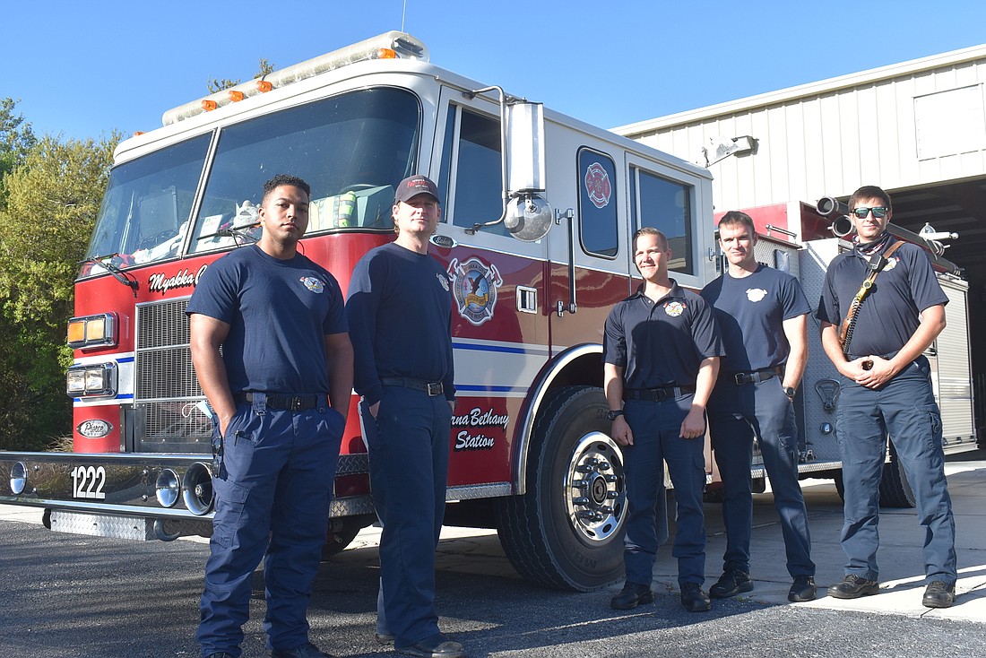 Robert Turner, Ben Guth, Trevor Garofalo, Ray Sullivan and J.T. Bacigalupi are Myakka City Fire Department firefighters. East Manatee Fire Rescue District is discussing how their benefits will transfer post-merger. File photo.