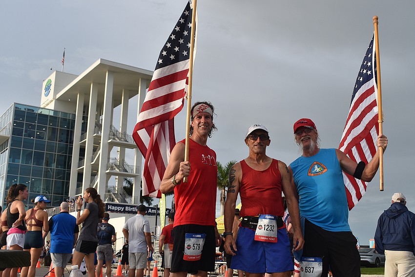 Sarasota residents Shawn Drouin, Jeff Ealy and Andy Kish ran in the four-mile race. It was Ealy's 908th consecutive day of running.