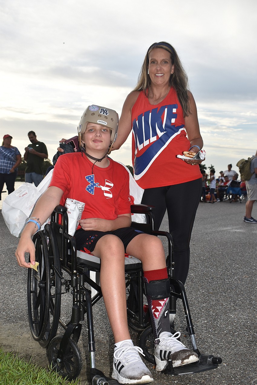Sarasota's Ayden Latham, 12, and Denise Latham said this year's Fireworks On the Lake was 