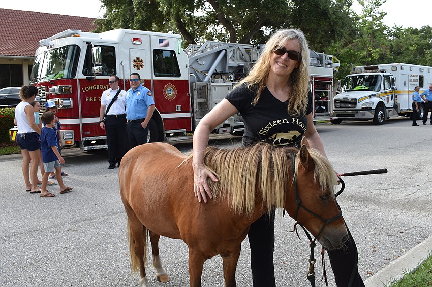 The horse named Uncle D and Maeve Schleicher walked in Sunday morning's Freedom Fest parade.