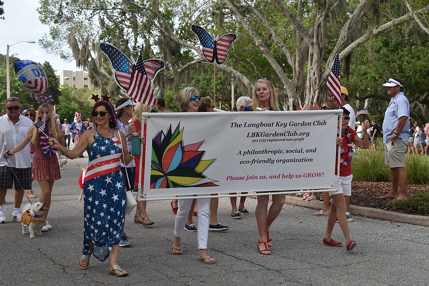 The Longboat key Garden Club walked in the parade.